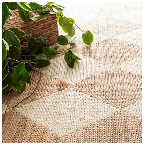 http://www.lavenderfieldsonline.com/cdn/shop/products/dash-and-albert-harwich-natural-woven-jute-rug-1.jpg?v=1698231146